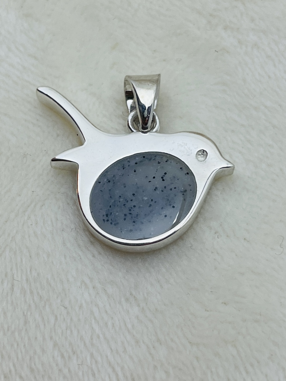 Deze vogel hanger as &moedermelk geeft voor altijd een herinnering aan je dierbare